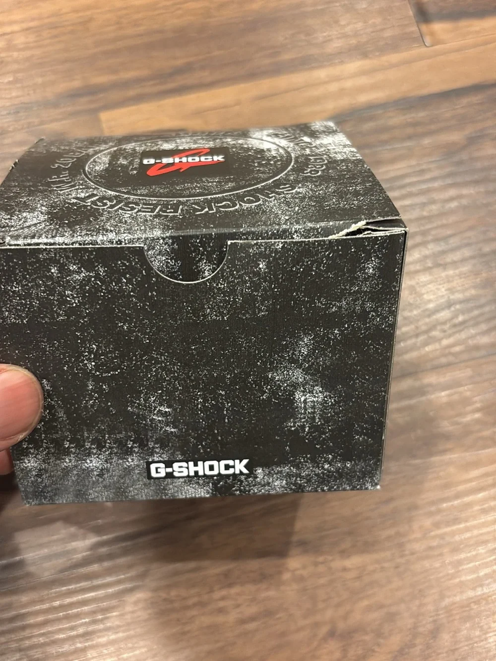 Casio G-Shock Blue Watch with White Bezel and Red Accents